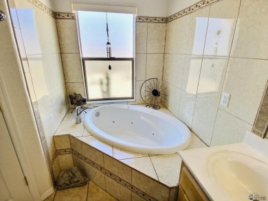 Welcome to this stunning 3-bed, 2-bath contemporary home nestled on Foothills Executive Golf Course in Arizona - for sale on GolfHomes.com, golf home, golf lot