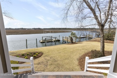Welcome to this exquisite riverfront property, located in a golf on Carolina National Golf Club in North Carolina - for sale on GolfHomes.com, golf home, golf lot