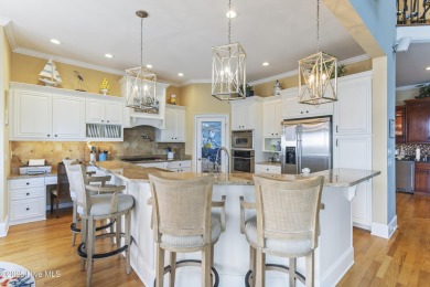 Welcome to this exquisite riverfront property, located in a golf on Carolina National Golf Club in North Carolina - for sale on GolfHomes.com, golf home, golf lot