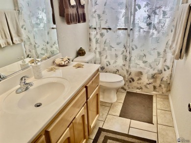 Welcome to this stunning 3-bed, 2-bath contemporary home nestled on Foothills Executive Golf Course in Arizona - for sale on GolfHomes.com, golf home, golf lot