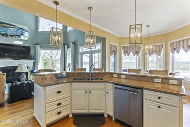 Welcome to this exquisite riverfront property, located in a golf on Carolina National Golf Club in North Carolina - for sale on GolfHomes.com, golf home, golf lot