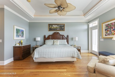 Welcome to this exquisite riverfront property, located in a golf on Carolina National Golf Club in North Carolina - for sale on GolfHomes.com, golf home, golf lot