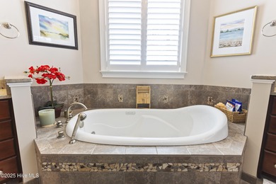 Welcome to this exquisite riverfront property, located in a golf on Carolina National Golf Club in North Carolina - for sale on GolfHomes.com, golf home, golf lot