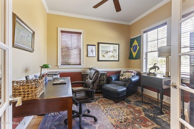 Welcome to this exquisite riverfront property, located in a golf on Carolina National Golf Club in North Carolina - for sale on GolfHomes.com, golf home, golf lot