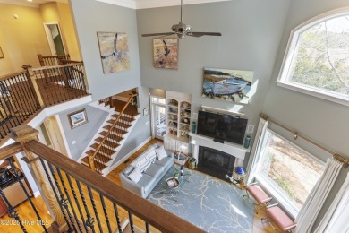 Welcome to this exquisite riverfront property, located in a golf on Carolina National Golf Club in North Carolina - for sale on GolfHomes.com, golf home, golf lot