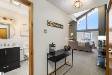 Experience the best of resort living in this fully furnished on Schuss Mountain Golf Club in Michigan - for sale on GolfHomes.com, golf home, golf lot