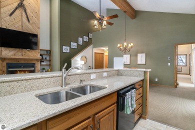 Experience the best of resort living in this fully furnished on Schuss Mountain Golf Club in Michigan - for sale on GolfHomes.com, golf home, golf lot