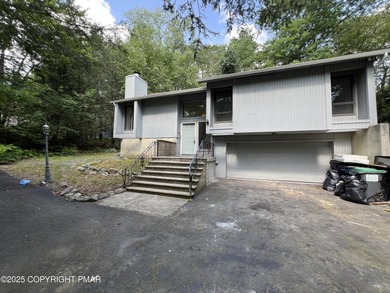 Located among a golf course, fishing spots and pools, tennis on Pocono Farms Country Club in Pennsylvania - for sale on GolfHomes.com, golf home, golf lot