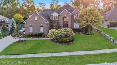 Welcome to this stunning colonial brick home in the highly on The Orchards Golf Club in Michigan - for sale on GolfHomes.com, golf home, golf lot