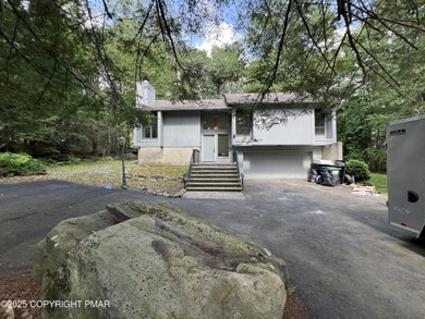 Located among a golf course, fishing spots and pools, tennis on Pocono Farms Country Club in Pennsylvania - for sale on GolfHomes.com, golf home, golf lot