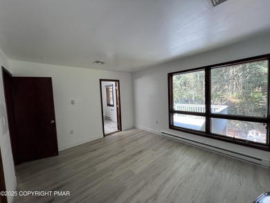 Located among a golf course, fishing spots and pools, tennis on Pocono Farms Country Club in Pennsylvania - for sale on GolfHomes.com, golf home, golf lot