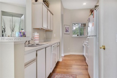 This custom Charleston model has it all--end unit with abundant on Okatie Creek Golf Club in South Carolina - for sale on GolfHomes.com, golf home, golf lot