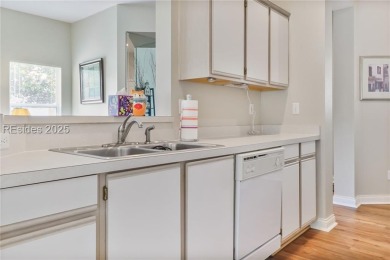 This custom Charleston model has it all--end unit with abundant on Okatie Creek Golf Club in South Carolina - for sale on GolfHomes.com, golf home, golf lot
