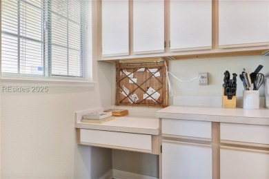 This custom Charleston model has it all--end unit with abundant on Okatie Creek Golf Club in South Carolina - for sale on GolfHomes.com, golf home, golf lot