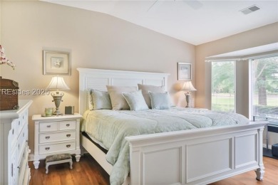 This custom Charleston model has it all--end unit with abundant on Okatie Creek Golf Club in South Carolina - for sale on GolfHomes.com, golf home, golf lot