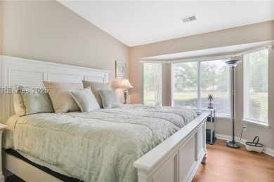 This custom Charleston model has it all--end unit with abundant on Okatie Creek Golf Club in South Carolina - for sale on GolfHomes.com, golf home, golf lot