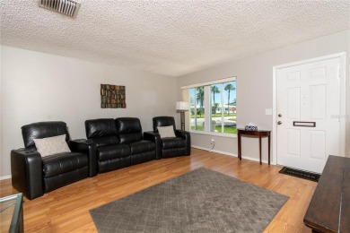 Live high and dry in this beautifully upgraded home located in on Mainlands Golf Club in Florida - for sale on GolfHomes.com, golf home, golf lot