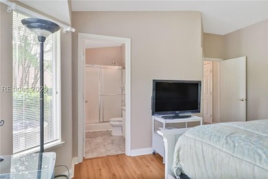 This custom Charleston model has it all--end unit with abundant on Okatie Creek Golf Club in South Carolina - for sale on GolfHomes.com, golf home, golf lot