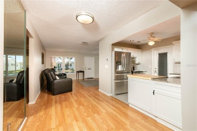 Live high and dry in this beautifully upgraded home located in on Mainlands Golf Club in Florida - for sale on GolfHomes.com, golf home, golf lot