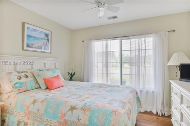 This custom Charleston model has it all--end unit with abundant on Okatie Creek Golf Club in South Carolina - for sale on GolfHomes.com, golf home, golf lot