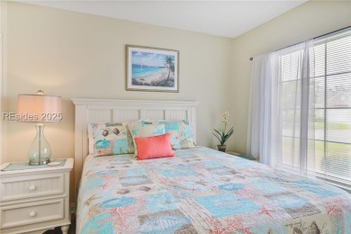 This custom Charleston model has it all--end unit with abundant on Okatie Creek Golf Club in South Carolina - for sale on GolfHomes.com, golf home, golf lot