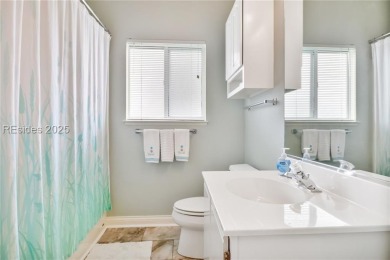 This custom Charleston model has it all--end unit with abundant on Okatie Creek Golf Club in South Carolina - for sale on GolfHomes.com, golf home, golf lot