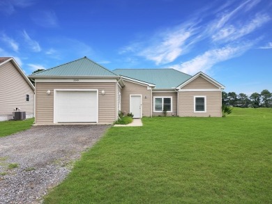 Welcome to your dream home nestled on the serene 6th fairway of on Captains Cove Golf and Yacht Club in Virginia - for sale on GolfHomes.com, golf home, golf lot