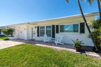 Live high and dry in this beautifully upgraded home located in on Mainlands Golf Club in Florida - for sale on GolfHomes.com, golf home, golf lot
