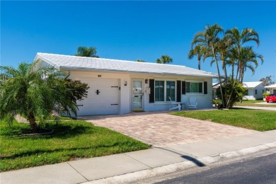 Live high and dry in this beautifully upgraded home located in on Mainlands Golf Club in Florida - for sale on GolfHomes.com, golf home, golf lot