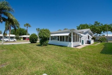 Live high and dry in this beautifully upgraded home located in on Mainlands Golf Club in Florida - for sale on GolfHomes.com, golf home, golf lot