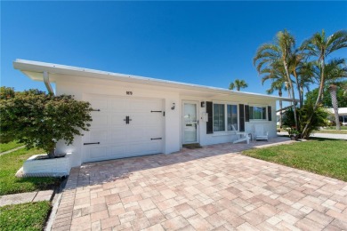 Live high and dry in this beautifully upgraded home located in on Mainlands Golf Club in Florida - for sale on GolfHomes.com, golf home, golf lot