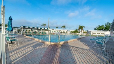 Live high and dry in this beautifully upgraded home located in on Mainlands Golf Club in Florida - for sale on GolfHomes.com, golf home, golf lot