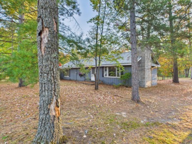 Discover your perfect starter home or getaway retreat just on Garland Resort and Golf Club  in Michigan - for sale on GolfHomes.com, golf home, golf lot