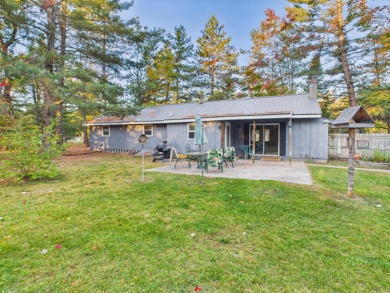 Discover your perfect starter home or getaway retreat just on Garland Resort and Golf Club  in Michigan - for sale on GolfHomes.com, golf home, golf lot