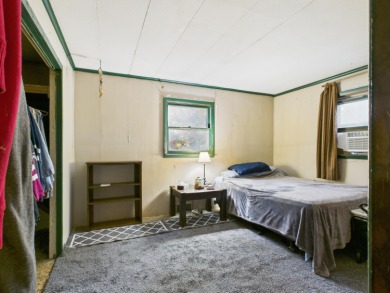 Discover your perfect starter home or getaway retreat just on Garland Resort and Golf Club  in Michigan - for sale on GolfHomes.com, golf home, golf lot