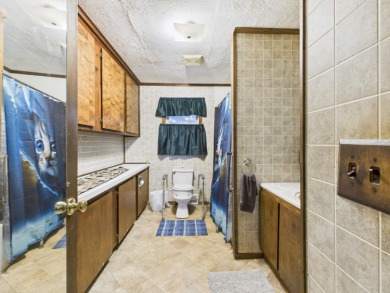 Discover your perfect starter home or getaway retreat just on Garland Resort and Golf Club  in Michigan - for sale on GolfHomes.com, golf home, golf lot