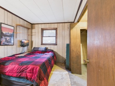 Discover your perfect starter home or getaway retreat just on Garland Resort and Golf Club  in Michigan - for sale on GolfHomes.com, golf home, golf lot
