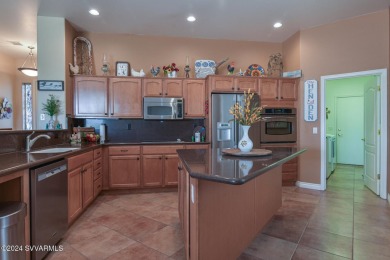 This gem of a home is located in the gated subdivision of Dorado on Verde Santa Fe Golf Club in Arizona - for sale on GolfHomes.com, golf home, golf lot