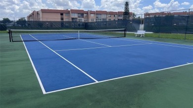 Golf, indoor and outdoor pools, tennis, movies and pickleball on Sunrise Lakes Phase III in Florida - for sale on GolfHomes.com, golf home, golf lot