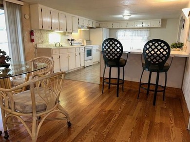 Amazing 3 bedroom, 2 full-bath double-wide could be yours in on Wedgewood Golf Club in Florida - for sale on GolfHomes.com, golf home, golf lot