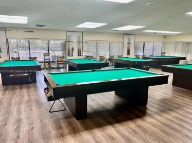 Golf, indoor and outdoor pools, tennis, movies and pickleball on Sunrise Lakes Phase III in Florida - for sale on GolfHomes.com, golf home, golf lot