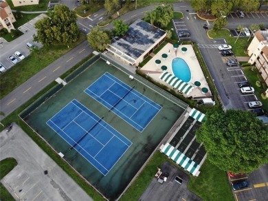 Golf, indoor and outdoor pools, tennis, movies and pickleball on Sunrise Lakes Phase III in Florida - for sale on GolfHomes.com, golf home, golf lot