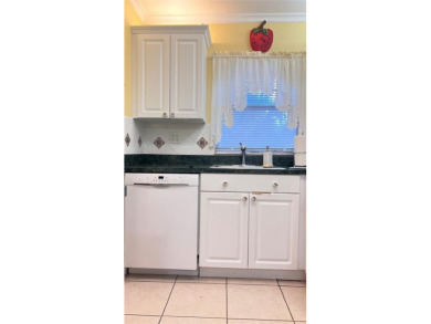 Golf, indoor and outdoor pools, tennis, movies and pickleball on Sunrise Lakes Phase III in Florida - for sale on GolfHomes.com, golf home, golf lot