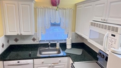 Golf, indoor and outdoor pools, tennis, movies and pickleball on Sunrise Lakes Phase III in Florida - for sale on GolfHomes.com, golf home, golf lot