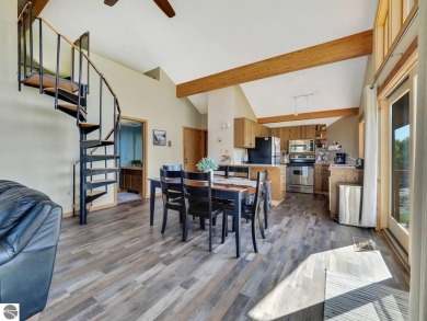 Stunning 3-Bedroom Penthouse Condo Overlooking Golf Course at on Schuss Mountain Golf Club in Michigan - for sale on GolfHomes.com, golf home, golf lot