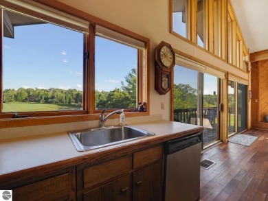 Stunning 3-Bedroom Penthouse Condo Overlooking Golf Course at on Schuss Mountain Golf Club in Michigan - for sale on GolfHomes.com, golf home, golf lot