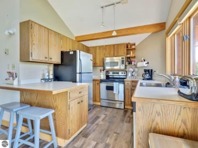 Stunning 3-Bedroom Penthouse Condo Overlooking Golf Course at on Schuss Mountain Golf Club in Michigan - for sale on GolfHomes.com, golf home, golf lot