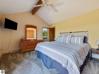 Stunning 3-Bedroom Penthouse Condo Overlooking Golf Course at on Schuss Mountain Golf Club in Michigan - for sale on GolfHomes.com, golf home, golf lot