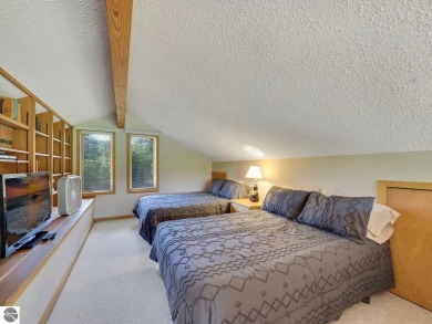 Stunning 3-Bedroom Penthouse Condo Overlooking Golf Course at on Schuss Mountain Golf Club in Michigan - for sale on GolfHomes.com, golf home, golf lot