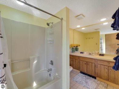 Stunning 3-Bedroom Penthouse Condo Overlooking Golf Course at on Schuss Mountain Golf Club in Michigan - for sale on GolfHomes.com, golf home, golf lot
